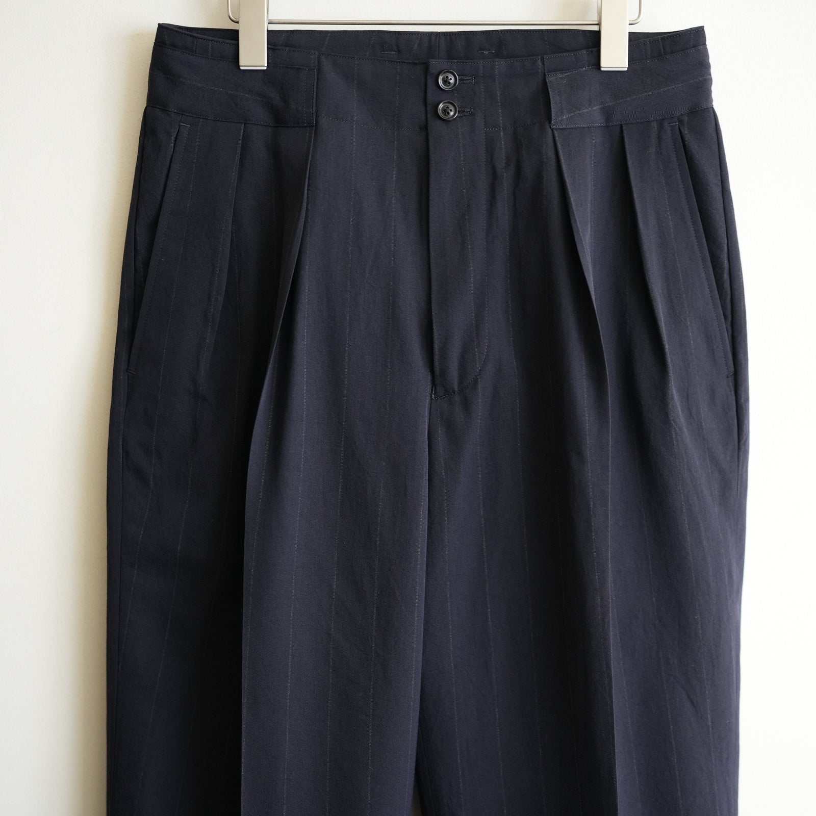 ULTERIOR WOOL WASHI STRIPE TUCKED TROUSERS – RASSEMBLE