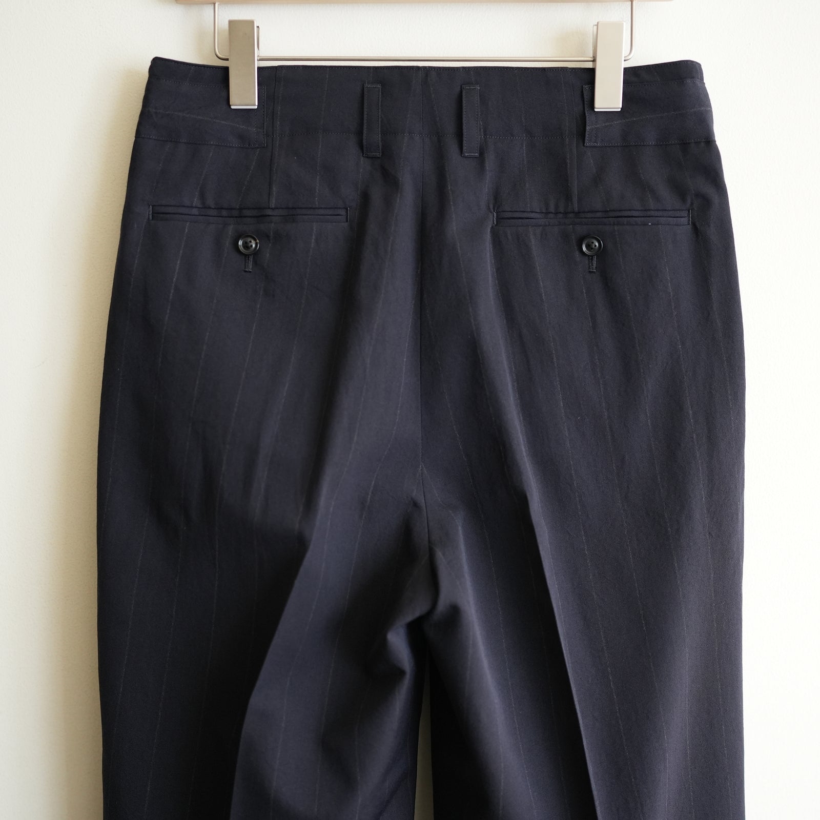 ULTERIOR WOOL WASHI STRIPE TUCKED TROUSERS – RASSEMBLE