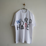 COMME des GARCONS SHIRT PRINTED BIG TEE WORLD HOPE