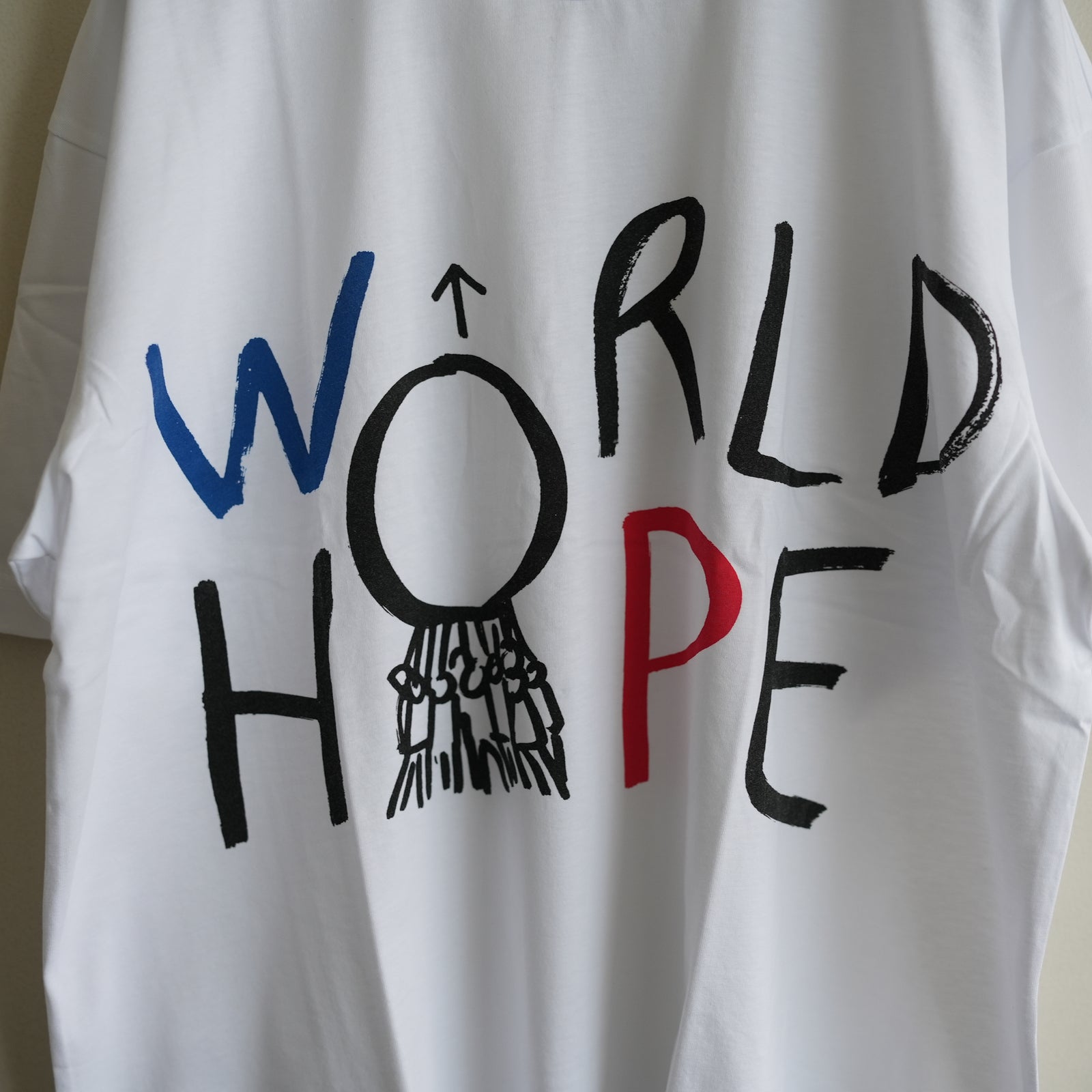 COMME des GARCONS SHIRT PRINTED BIG TEE WORLD HOPE – RASSEMBLE