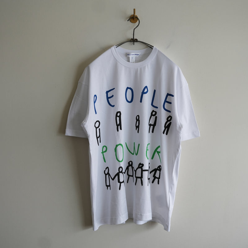 COMME des GARCONS SHIRT PRINTED BIG TEE PEOPLE POWER – RASSEMBLE