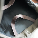 ERA. EO SHRINK RE:PIPE BAG CHOCO